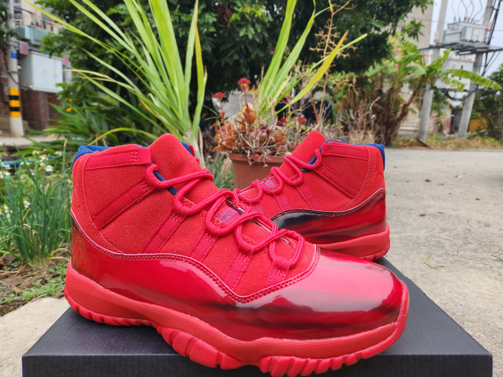 Air Jordan 11 Low Bright Red Sneakers