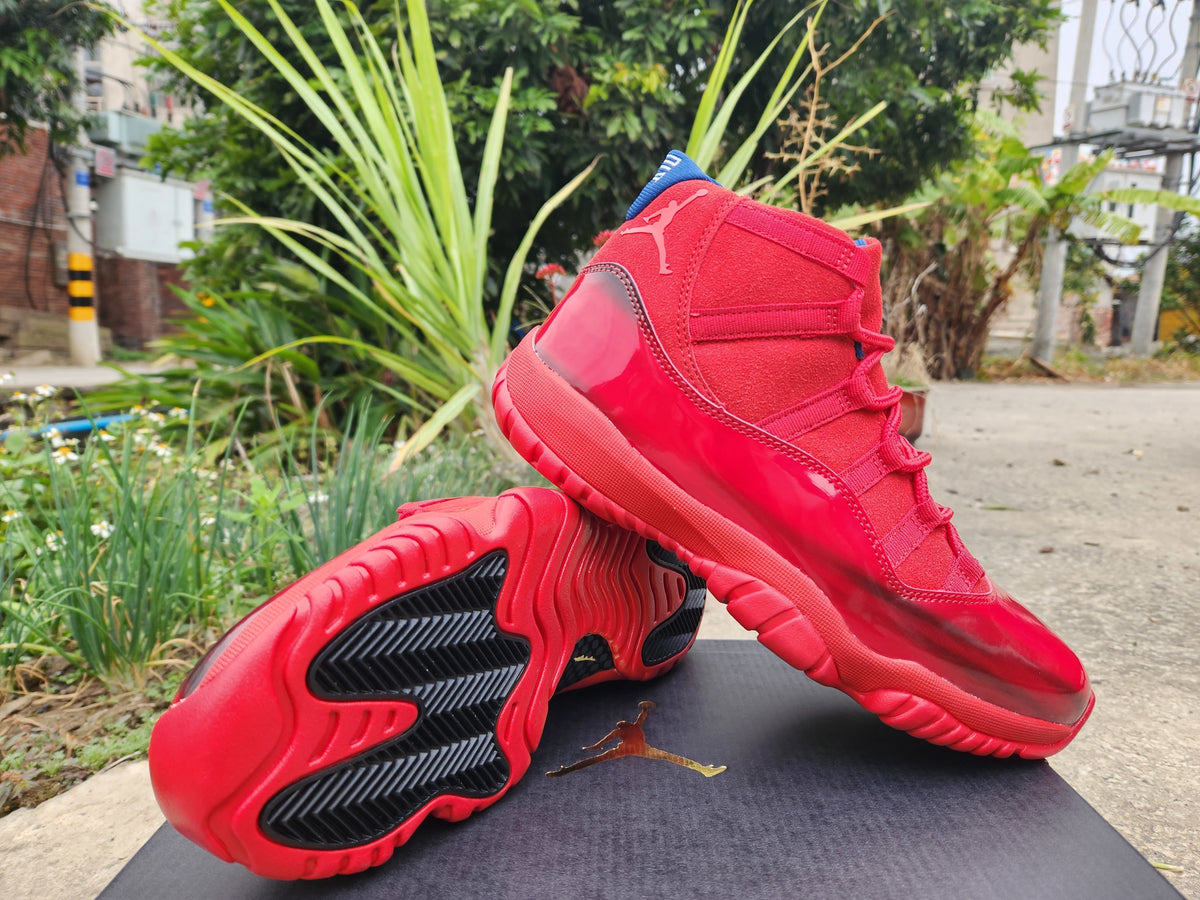 Air Jordan 11 Low Bright Red Sneakers